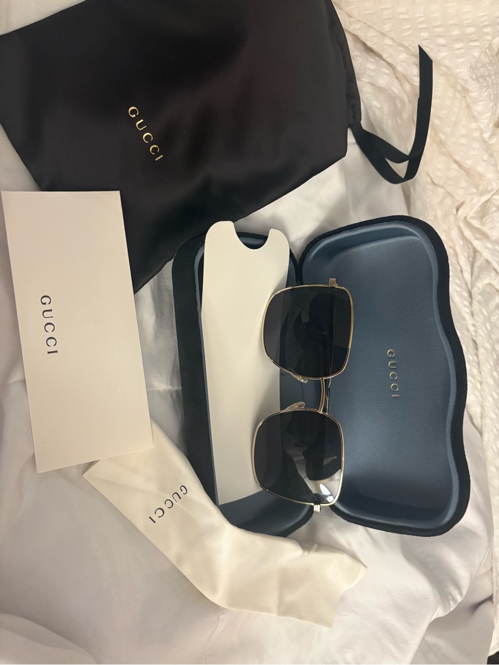 Gucci Gold Frame Sunglasses with Black Lenses